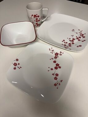 Hanami Garden Corelle White Dinnerware Set with Red Blossom Pattern.